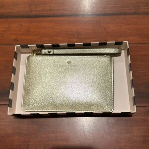 New in box Kate spade gold wristlet